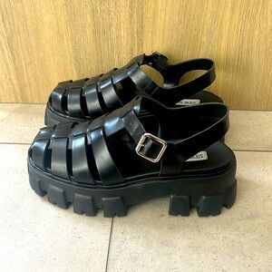 Steve Madden platform sandals.